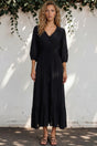 Model wearing Kiaba Maxi Dress in Black from Salty Crush