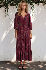 Model wearing Kiaba Maxi Dress in Vilma Print Wine from Salty Crush