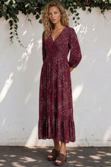 Model wearing Kiaba Maxi Dress in Vilma Print Wine from Salty Crush