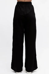 Black wide-leg pants on a white background