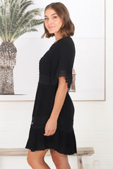 Leelie Mini Dress - Lace Embelished Tiered Dress with Bell Sleeves in Black