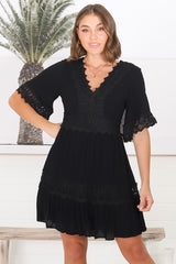 Leelie Mini Dress - Lace Embellished Tiered Dress with Bell Sleeves in Black