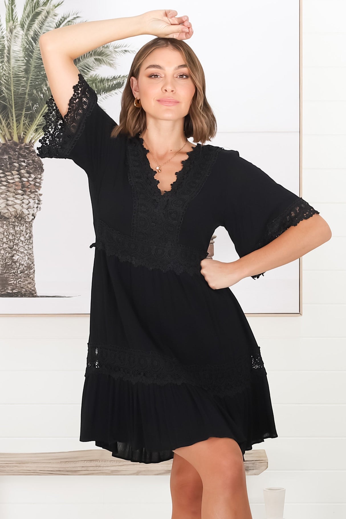 Leelie Mini Dress - Lace Embelished Tiered Dress with Bell Sleeves in Black