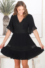 Leelie Mini Dress - Lace Embelished Tiered Dress with Bell Sleeves in Black