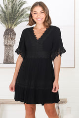 Leelie Mini Dress - Lace Embelished Tiered Dress with Bell Sleeves in Black