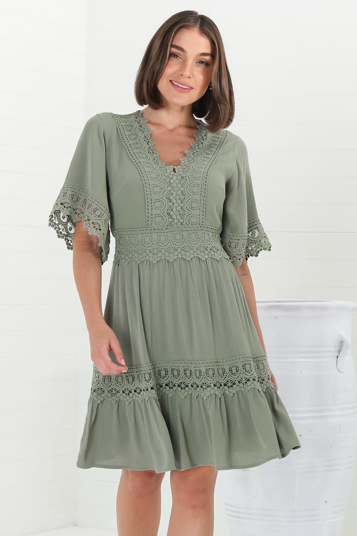 Leelie Mini Dress - Lace Embelished Tiered Dress with Bell Sleeves in Green