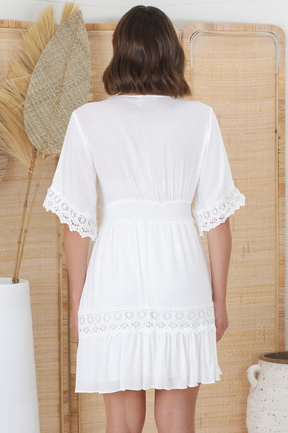 Leelie Mini Dress - Lace Embelished Tiered Dress with Bell Sleeves in White