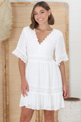 Leelie Mini Dress - Lace Embelished Tiered Dress with Bell Sleeves in White