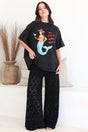 Model wearing Lenka Lace Pants in Black from Salty Crush
