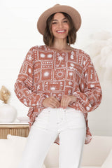 Lilah Blouse - Crew Neck High-Low Frill Hem Pull Over Blouse in Cailan Print Rust