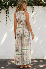 Model wearing Lira Jumpsuit in Tempest Print from Salty Crush
