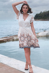 JAASE - Lizzie Mini Dress: Butterfly Cap Sleeve Button Down Dress with Pockets in Gemstone Print