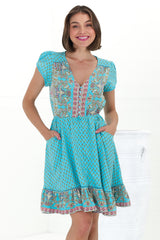 JAASE - Lizzie Mini Dress: Butterfly Cap Sleeve Button Down Dress with Pockets in Atlantis Print