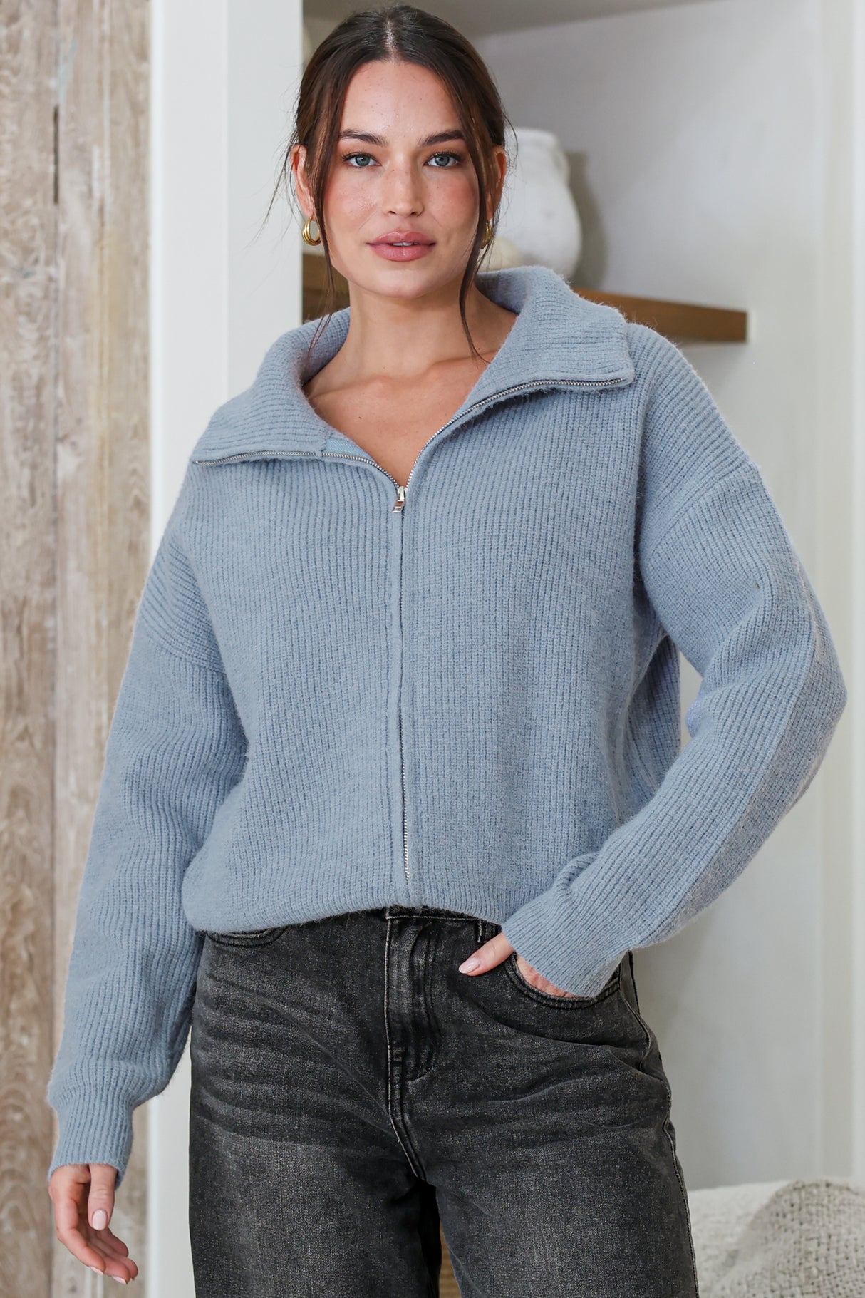 Model wearing Logan Cardigan in Blue from Salty Crush