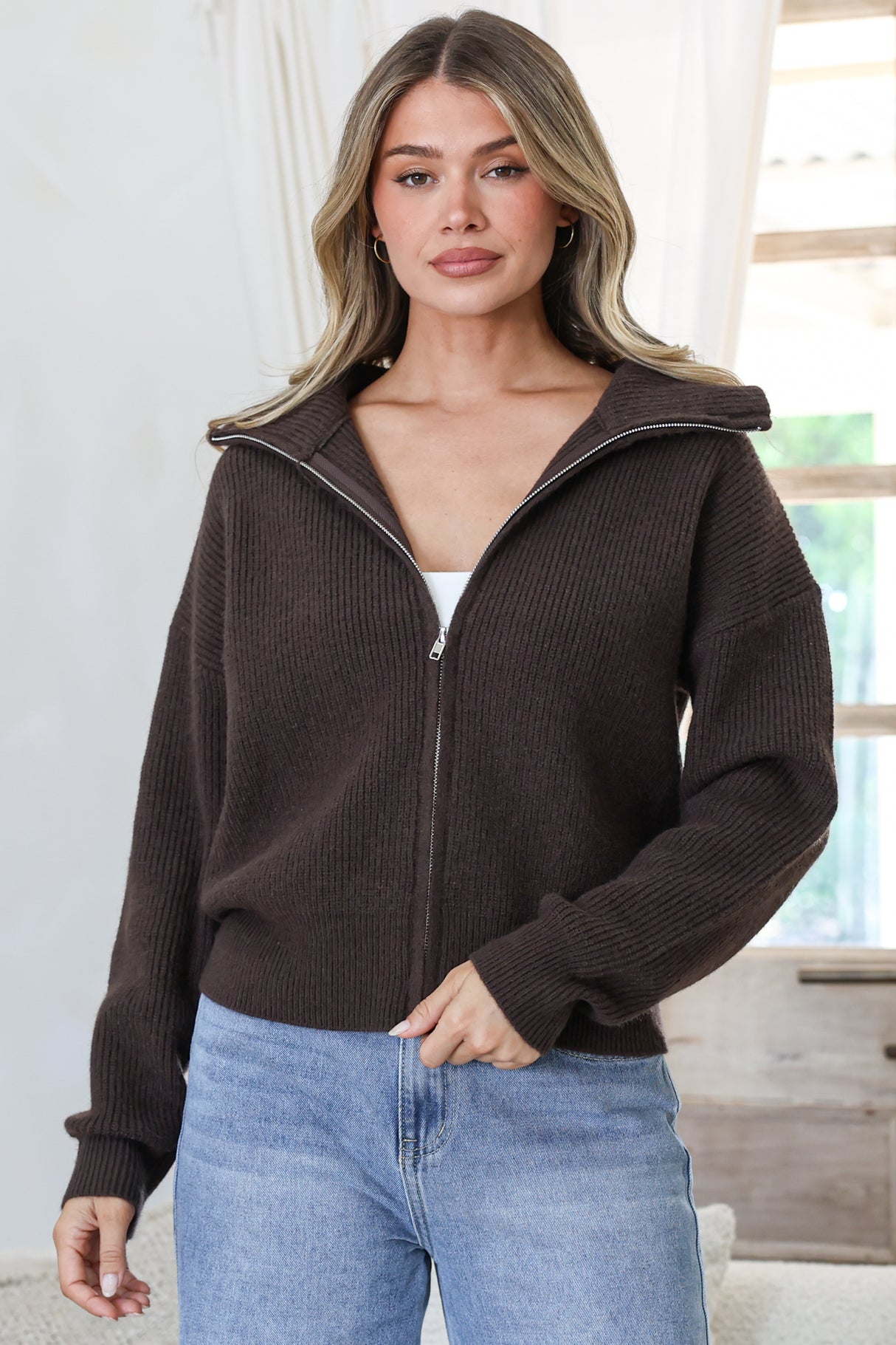 Model wearing Logan Cardigan in Coffee from Salty Crush