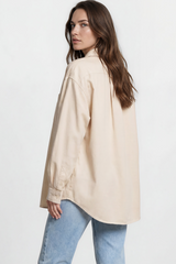 Model wearing Lopez Shirt in Beige from Salty Crush
