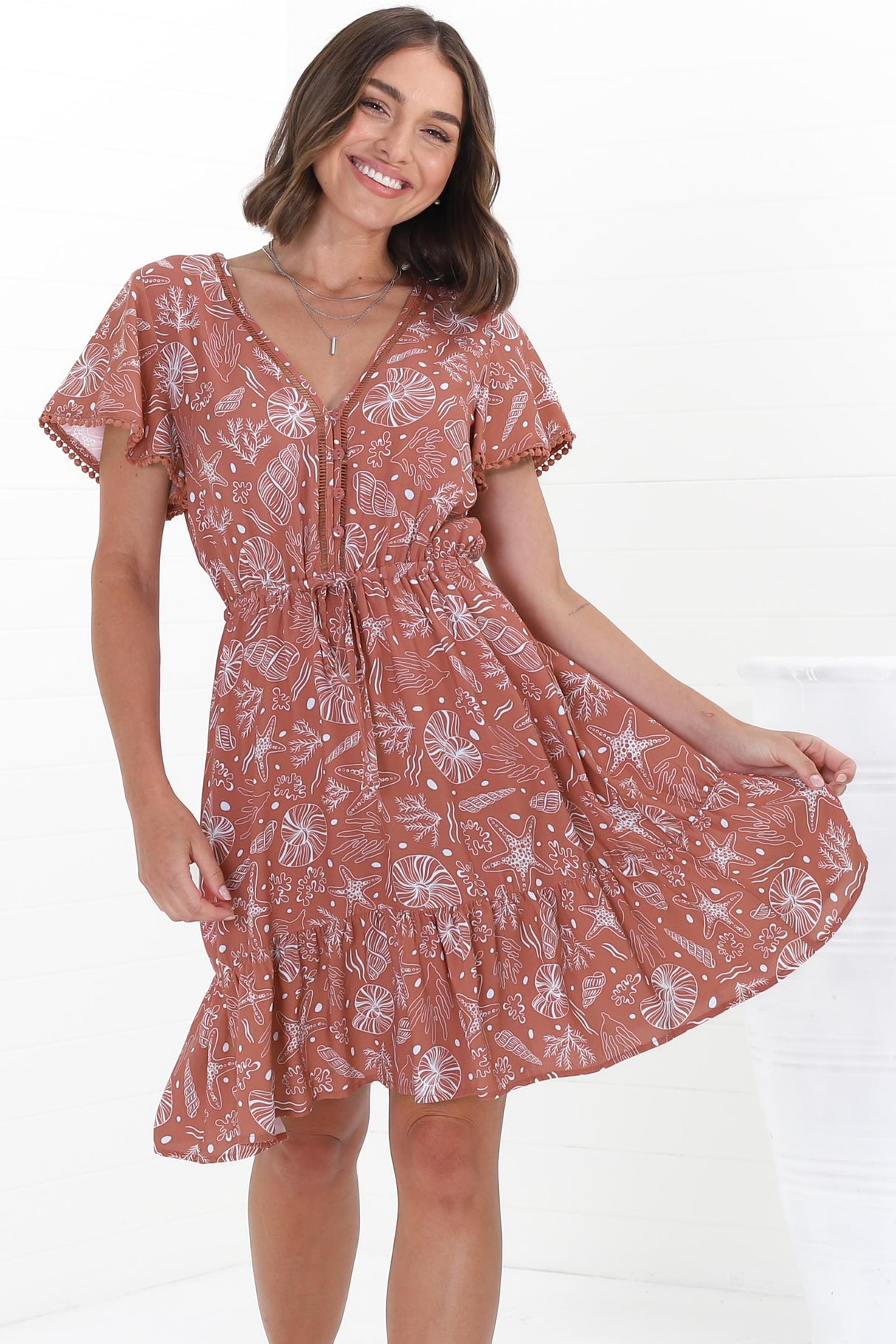 Lorena Mini Dress - V Neck Pull Tie Waist Mini Dress in Cove Print Terracotta