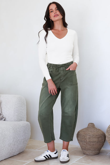 Model wearing Lowen Barrel Jeans in Khaki from Salty Crush