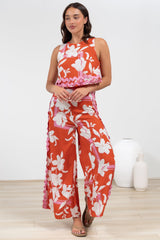 Luchia Jumpsuit - Sleeveless Overlay Bodice Jumpsuit with Ric Rac Trims in Blossaria Print