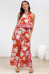 Luchia Jumpsuit - Sleeveless Overlay Bodice Jumpsuit with Ric Rac Trims in Blossaria Print