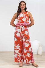 Luchia Jumpsuit - Sleeveless Overlay Bodice Jumpsuit with Ric Rac Trims in Blossaria Print