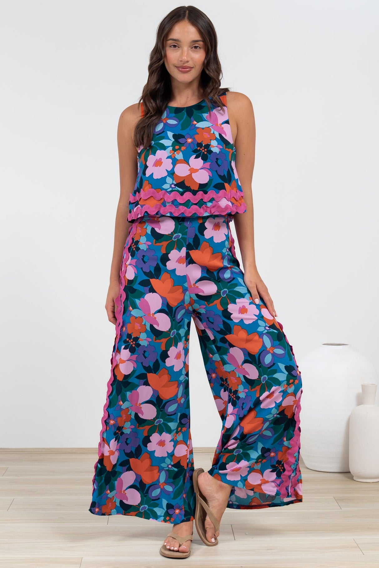 Luchia Jumpsuit - Sleeveless Overlay Bodice Jumpsuit with Ric Rac Trims in Florabelle Print