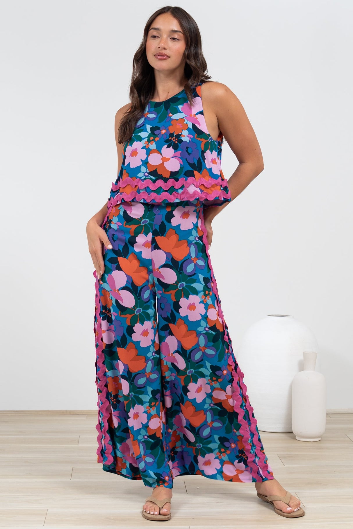 Luchia Jumpsuit - Sleeveless Overlay Bodice Jumpsuit with Ric Rac Trims in Florabelle Print