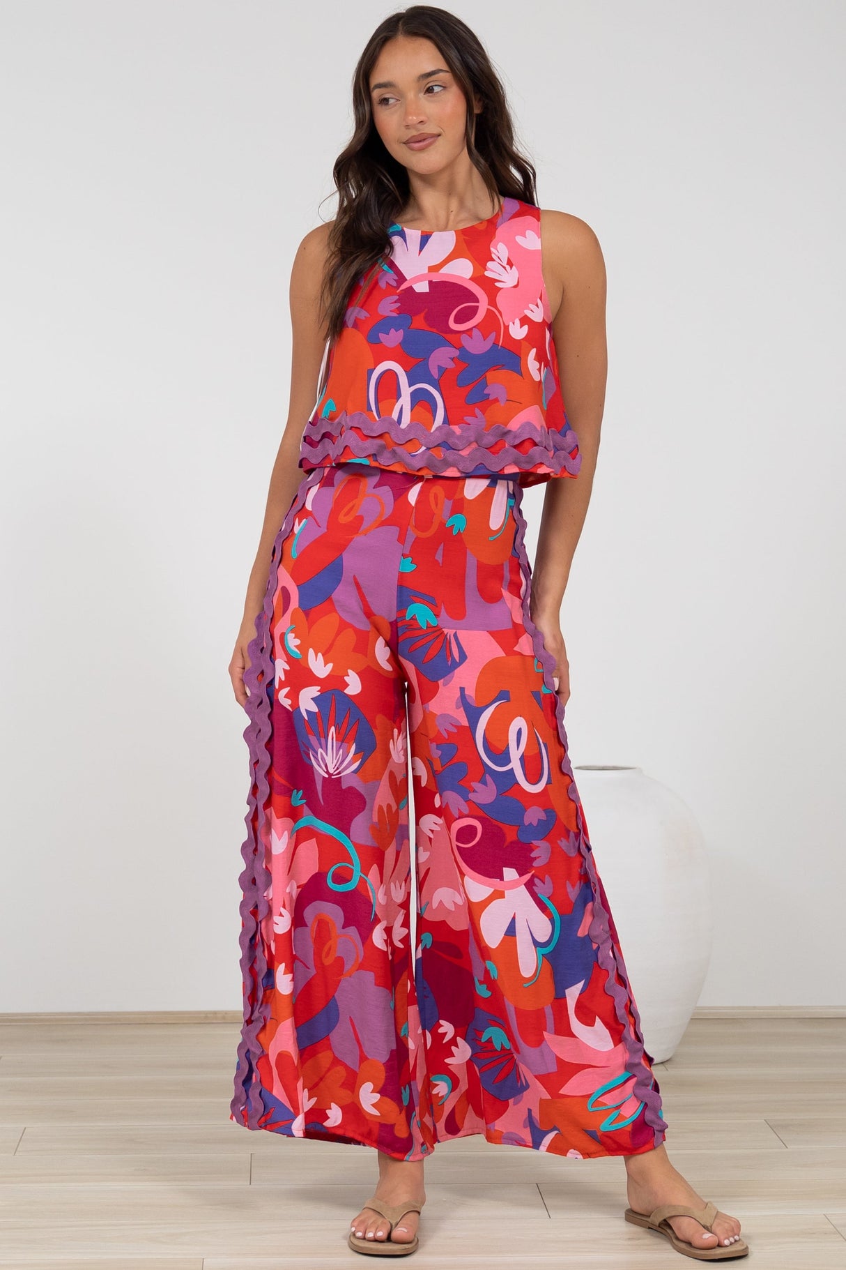Luchia Jumpsuit - Sleeveless Overlay Bodice Jumpsuit with Ric Rac Trims in Talina Print