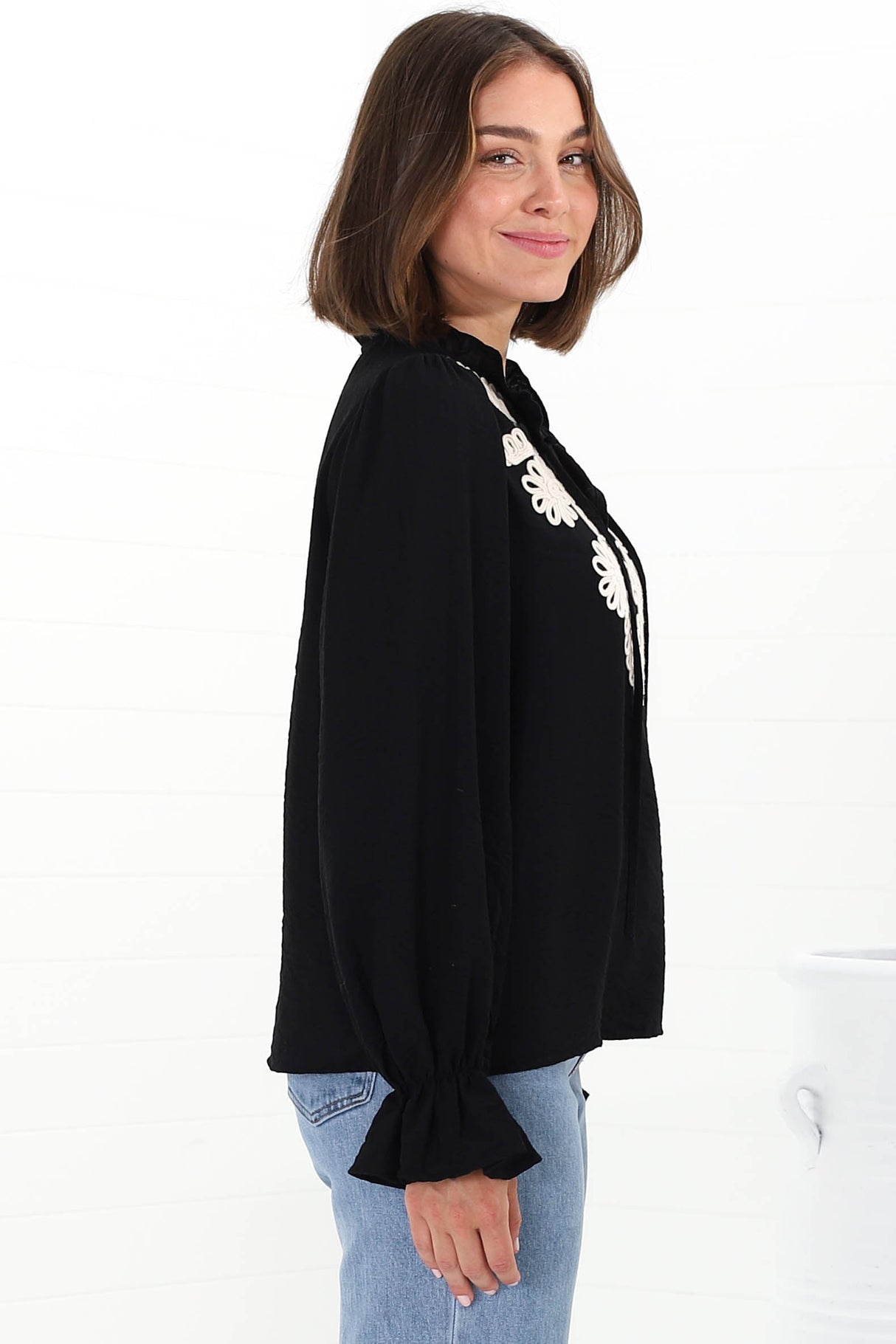 Lucian Blouse - Frill Neckline Pull Over Floral Decal Blouse in Black