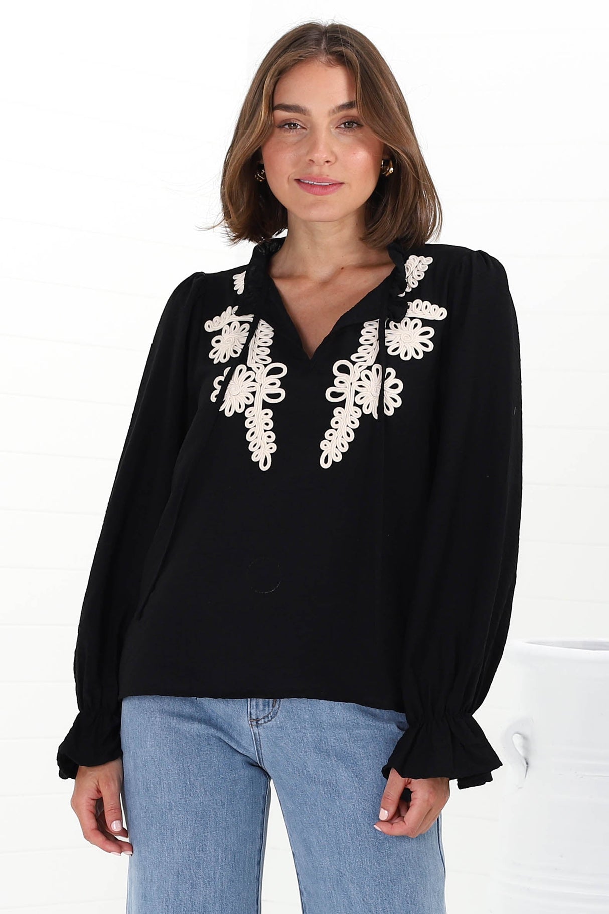 Lucian Blouse - Frill Neckline Pull Over Floral Decal Blouse in Black