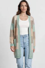 Model wearing Mabel Cardigan in Green from Salty Crush
