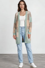 Model wearing Mabel Cardigan in Green from Salty Crush