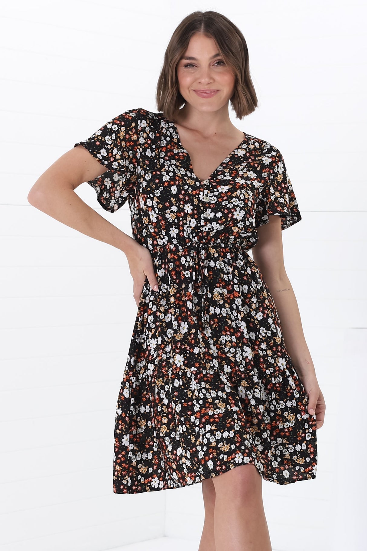 Malila Mini Dress - V Neck Pull Tie Waist Dress with Cap Sleeves in Hollie Print Black