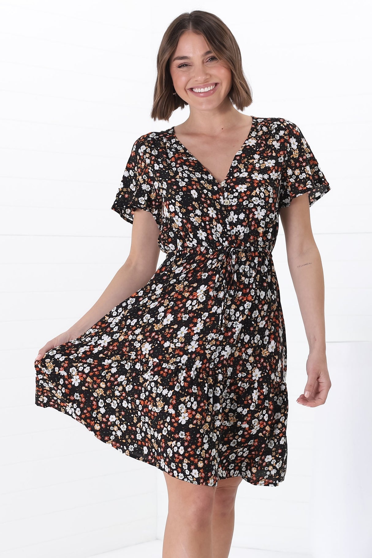 Malila Mini Dress - V Neck Pull Tie Waist Dress with Cap Sleeves in Hollie Print Black