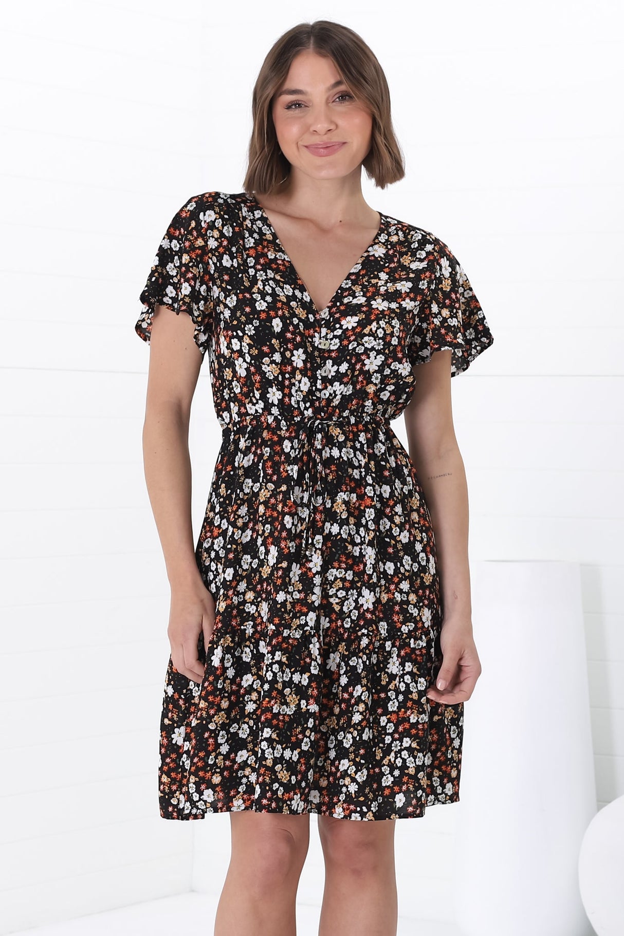 Malila Mini Dress - V Neck Pull Tie Waist Dress with Cap Sleeves in Hollie Print Black