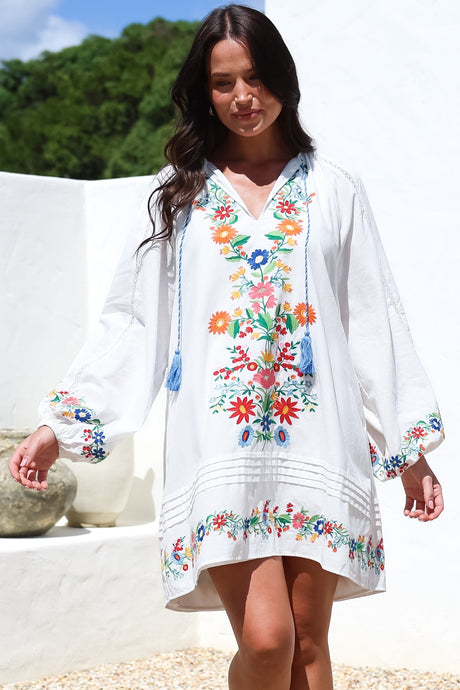Model wearing Margerie Long Sleeve Mini Dress in White from Salty Crush