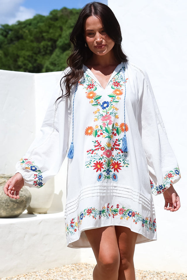 Model wearing Margerie Long Sleeve Mini Dress in White from Salty Crush