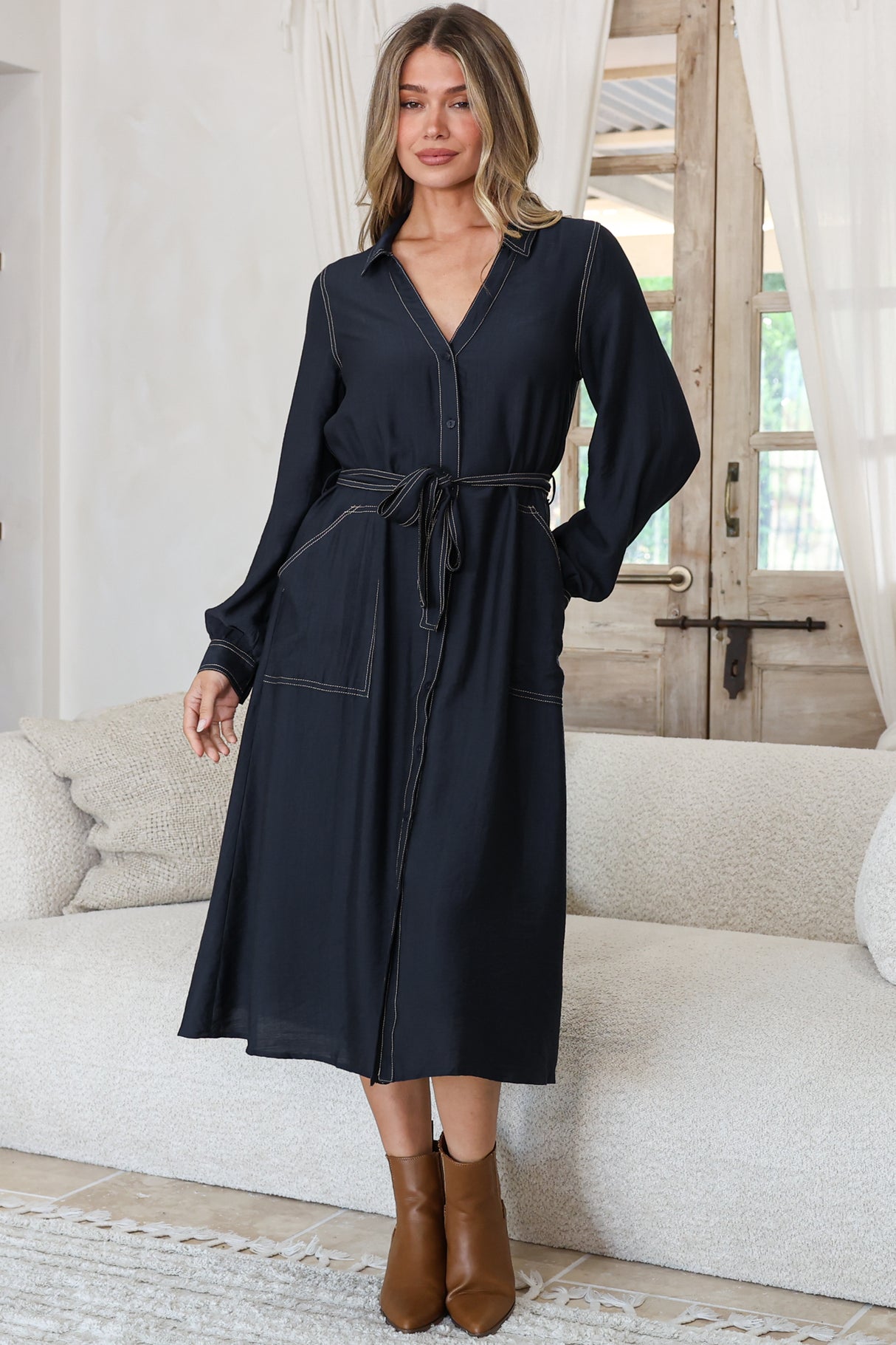 Model wearing Maria Midi Dress in Indigo from Salty Crush 