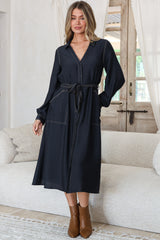 Model wearing Maria Midi Dress in Indigo from Salty Crush 