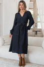 Model wearing Maria Midi Dress in Indigo from Salty Crush 