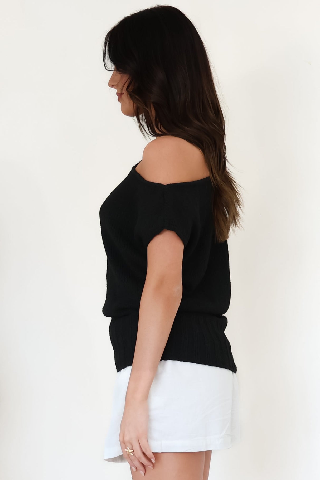 Mariah Knit Top - Sleeveless Asymmetric Neckline Top with Ribbed Hem in Black