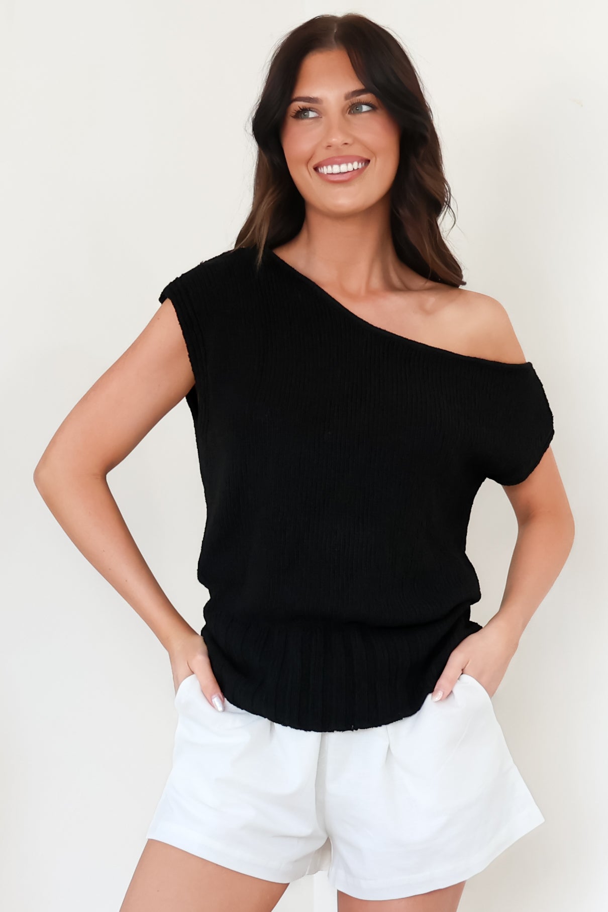 Mariah Knit Top - Sleeveless Asymmetric Neckline Top with Ribbed Hem in Black