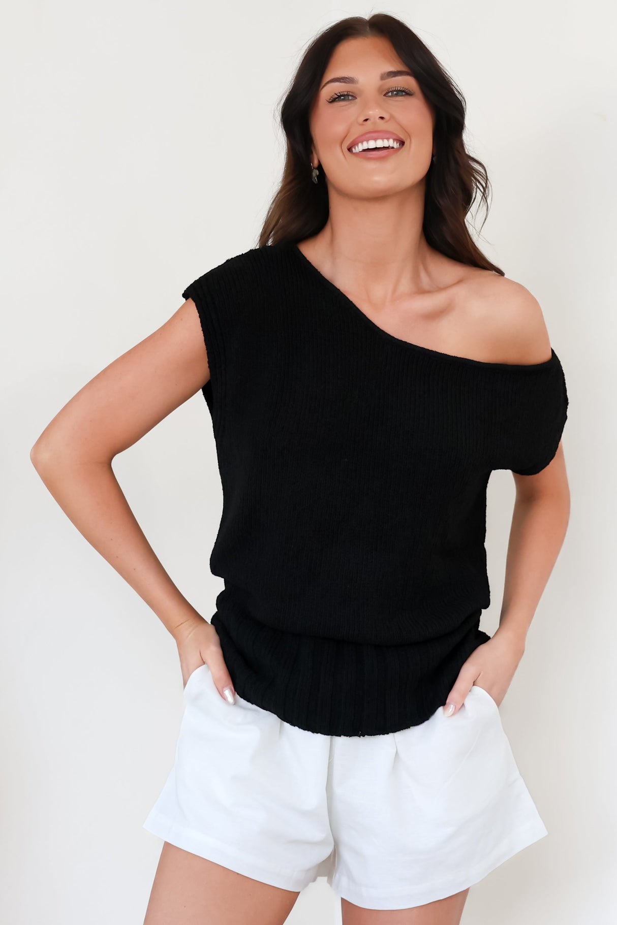 Mariah Knit Top - Sleeveless Asymmetric Neckline Top with Ribbed Hem in Black