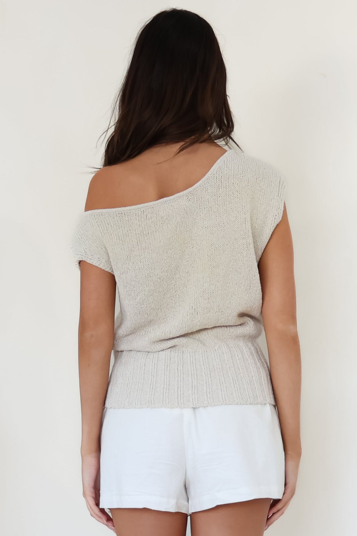 Mariah Knit Top - Sleeveless Asymmetric Neckline Top with Ribbed Hem in Oat