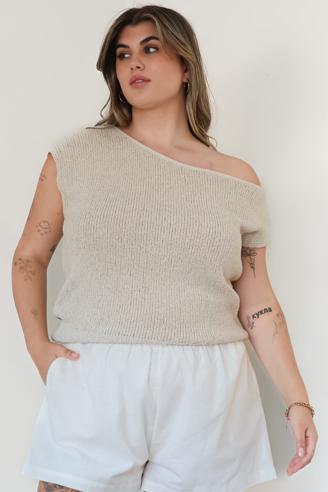 Mariah Knit Top - Sleeveless Asymmetric Neckline Top with Ribbed Hem in Oat
