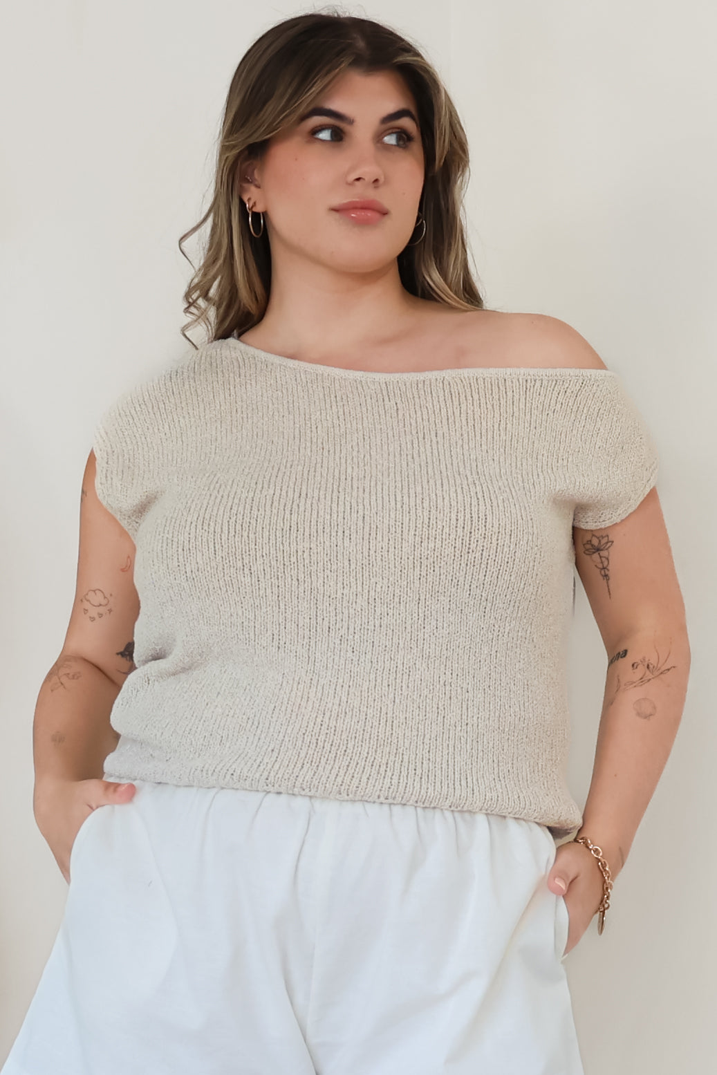 Mariah Knit Top - Sleeveless Asymmetric Neckline Top with Ribbed Hem in Oat