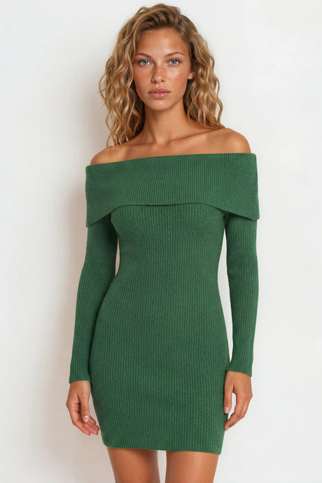 Woman wearing a green off-shoulder dress against a white background