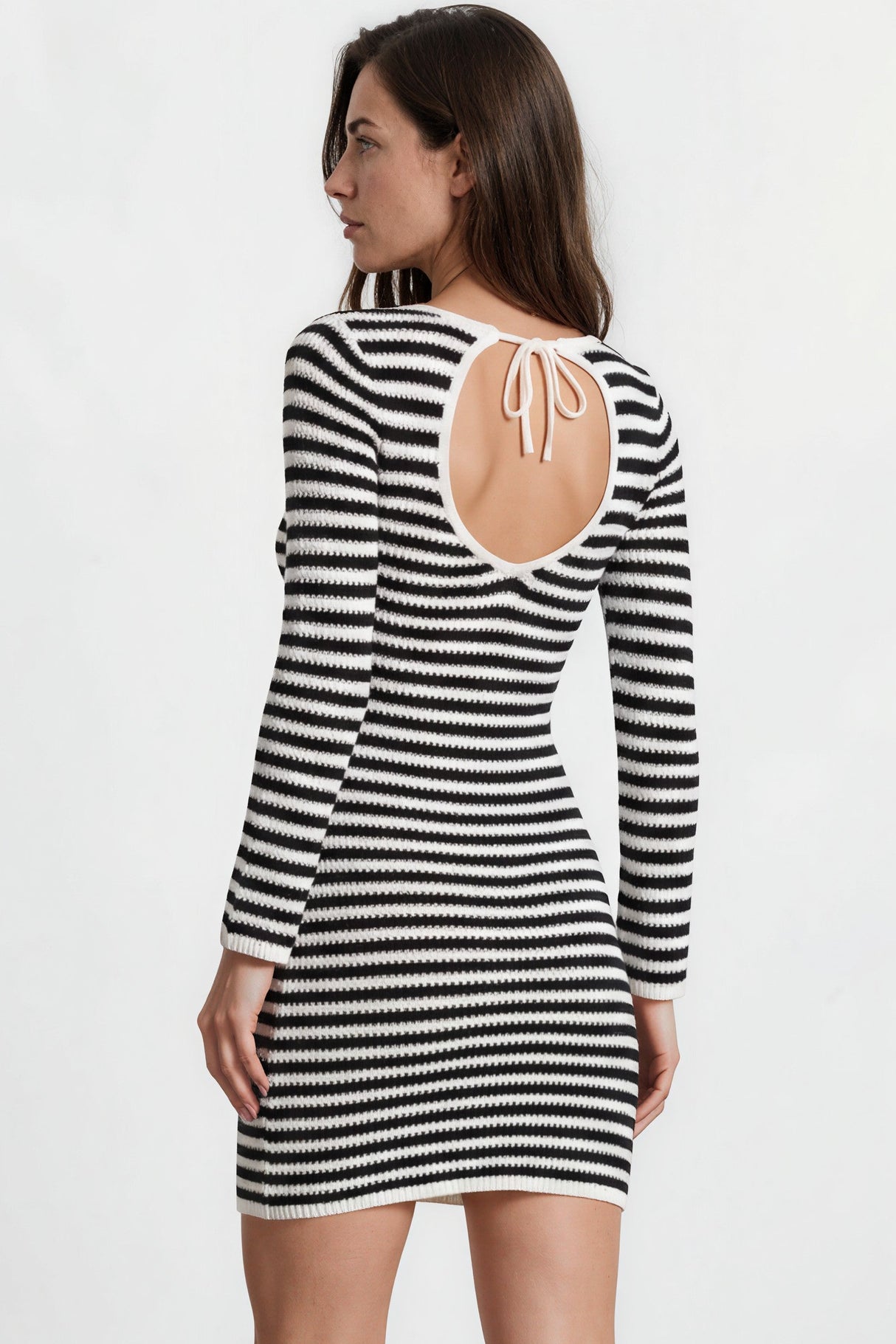 Model wearing Marza Mini Dress in Black/White from Salty Crush