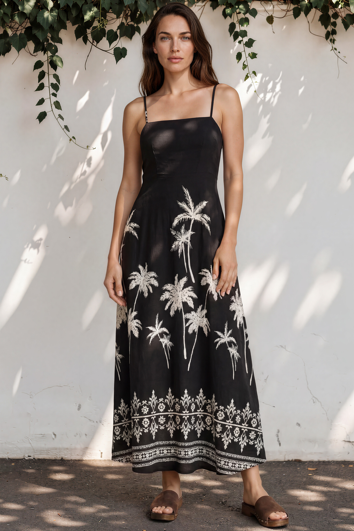 Model wearing Mattina Maxi Dress in Aviv Print Black from Salty Crush
