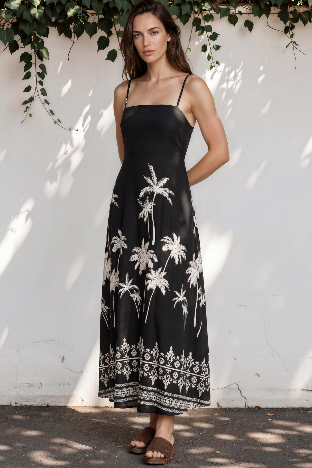 Model wearing Mattina Maxi Dress in Aviv Print Black from Salty Crush